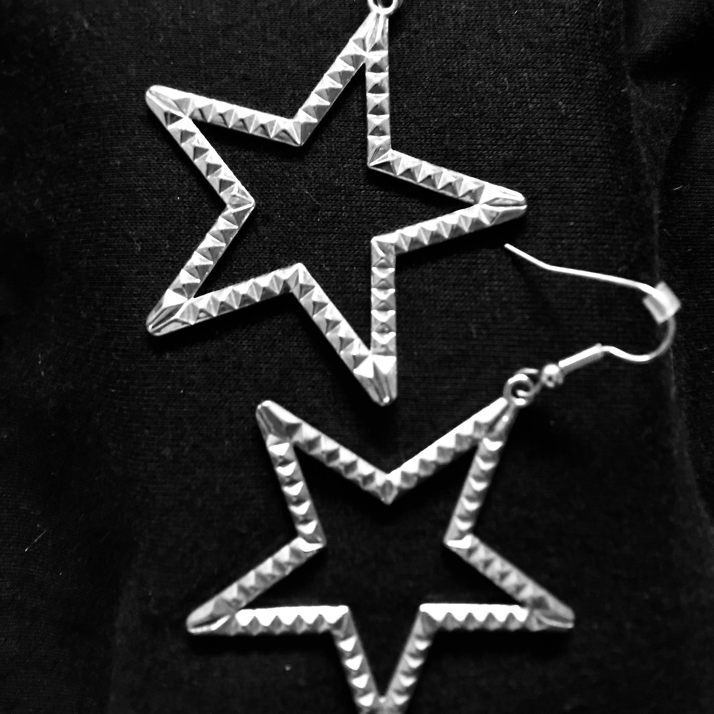 Medium size textured silver star earrings